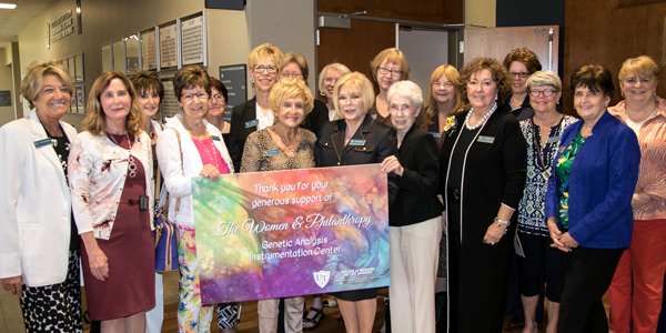 Members of Women & Philanthropy at the Genetic Analysis Instrumentation Center