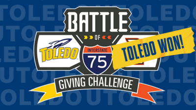 Battle of I-75 Giving Challenge Logo indicating Toledo's Win Battle of I-75 Giving Challenge Logo indicating Toledo's Win